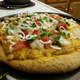 Illustration for article titled Taco Pizza is sitting on the stove, done